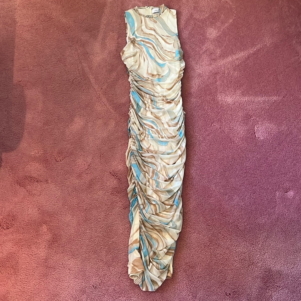 Super stretchy and comfy blue, white, brown swirled pattern dress. Medium.